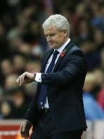 Hughes faces fans' wrath as real culprits slope off into the night